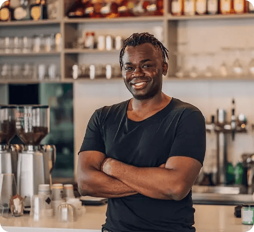 Small business owner posing and smiling. Small business owner posing and smiling.